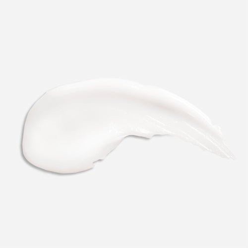 A texture shot of Beekman 1802's 3.4 oz Coconut Cream goat milk hand cream.