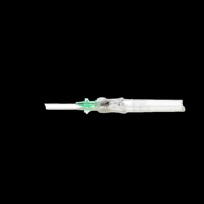 A clear intravenous cannula, lies horizontally against a black background. The cannula has a green plastic connector.