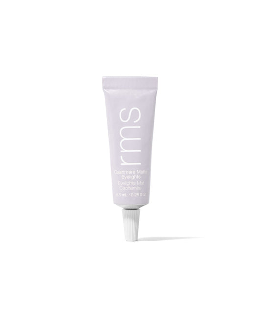 Tube of Cashmere Matte Eyelights eyeshadow in soft lavender shade with minimalistic white lettering and clean beauty design by RMS Beauty