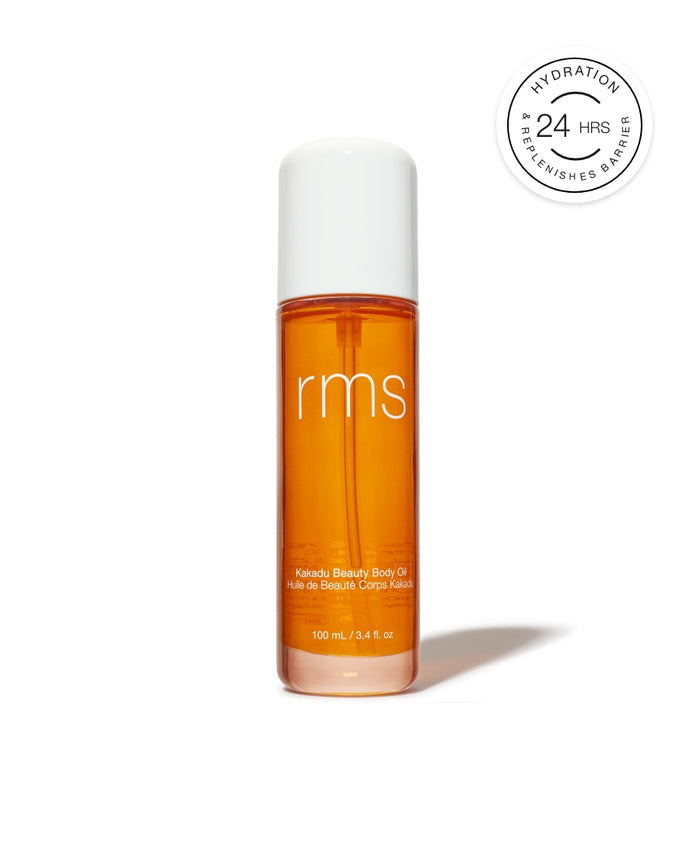RMS Beauty Kakadu Body Oil in a sleek amber bottle with white cap, designed to hydrate and replenish the skin’s barrier for 24 hours using clean, natural ingredients.