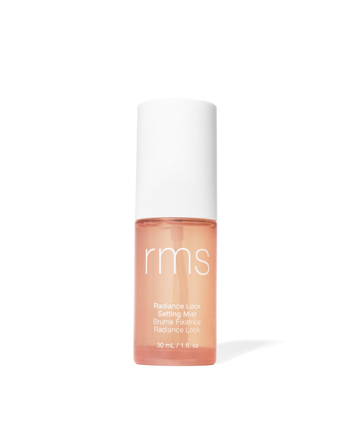 RMS Beauty Radiance Lock Setting Mist in a clear bottle with white cap, featuring clean ingredients and designed for sustainable packaging and cruelty free makeup.