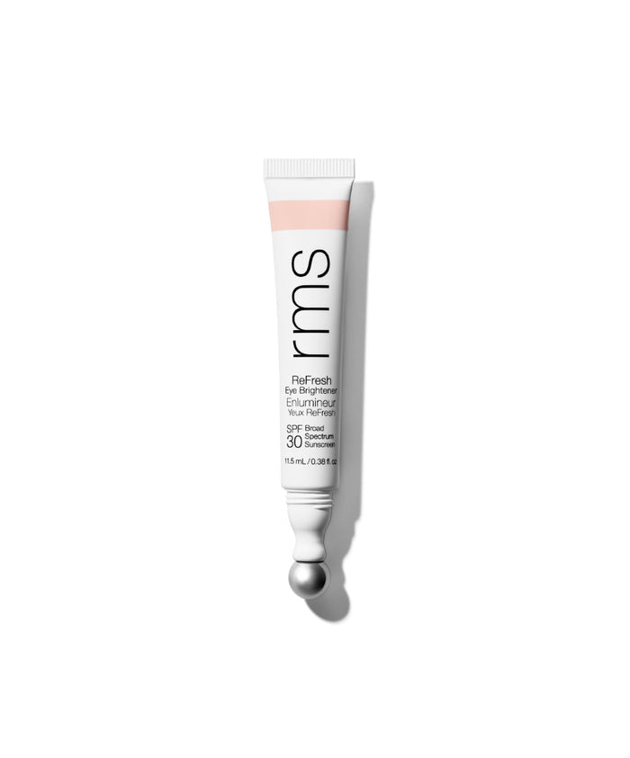 Tube of ReFresh Eye Brightener Broad Spectrum SPF 30 + Correcting Tint by RMS Beauty with a sleek metal applicator tip, highlighting clean beauty and skincare infused makeup.