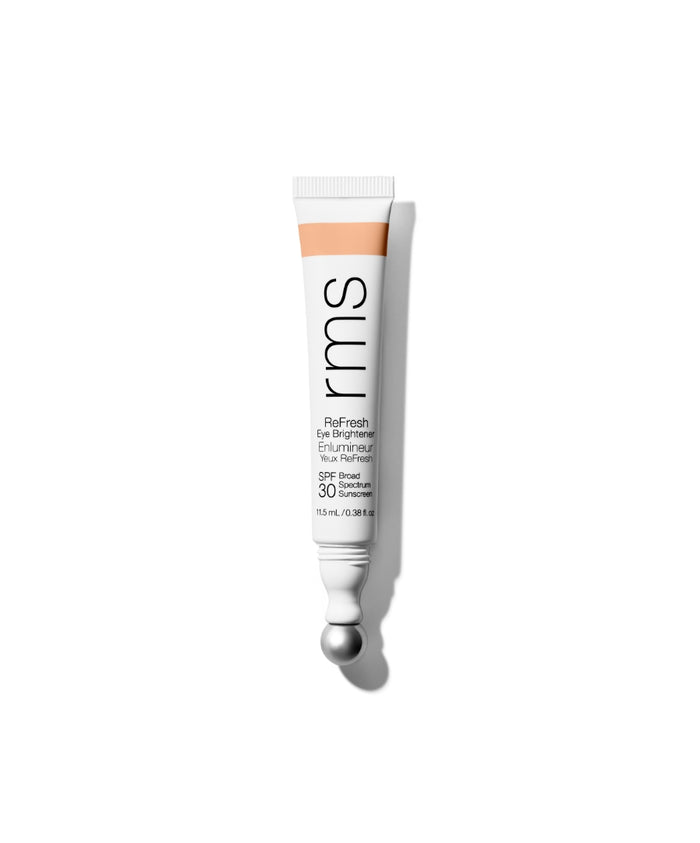 Tube of ReFresh Eye Brightener Broad Spectrum SPF 30 + Correcting Tint by RMS Beauty, featuring clean, natural ingredients and a metal applicator tip for easy application.
