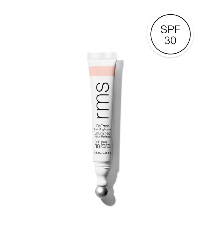 Tube of ReFresh Eye Brightener Broad Spectrum SPF 30 + Correcting Tint by RMS Beauty with a metal applicator tip and SPF 30 badge on white background.