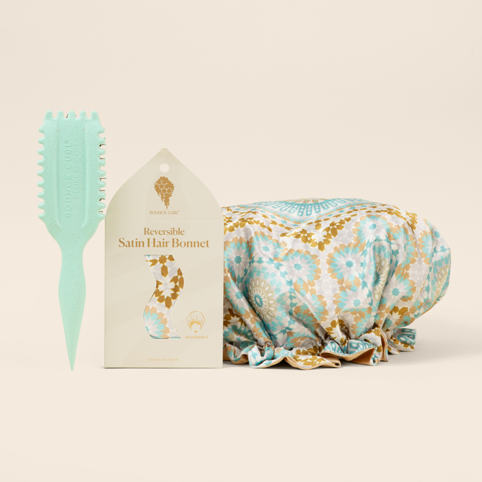 Teal Bounce Curl brush sits next to the Bounce Curl satin bonnet